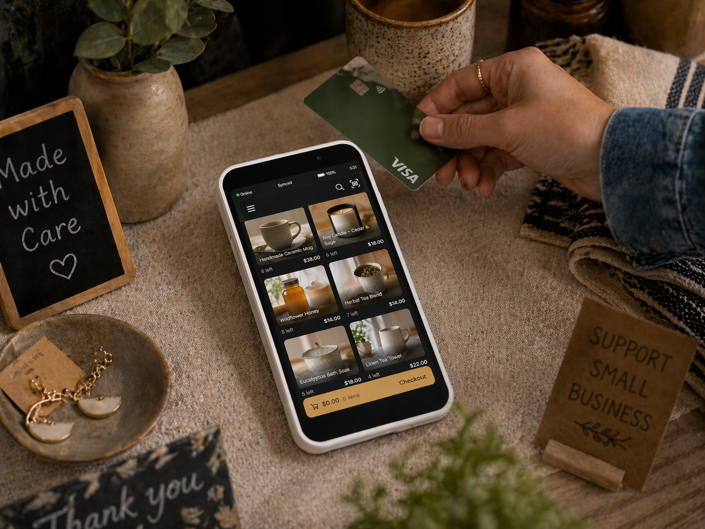 Customer tapping card on OneTill device at a market booth